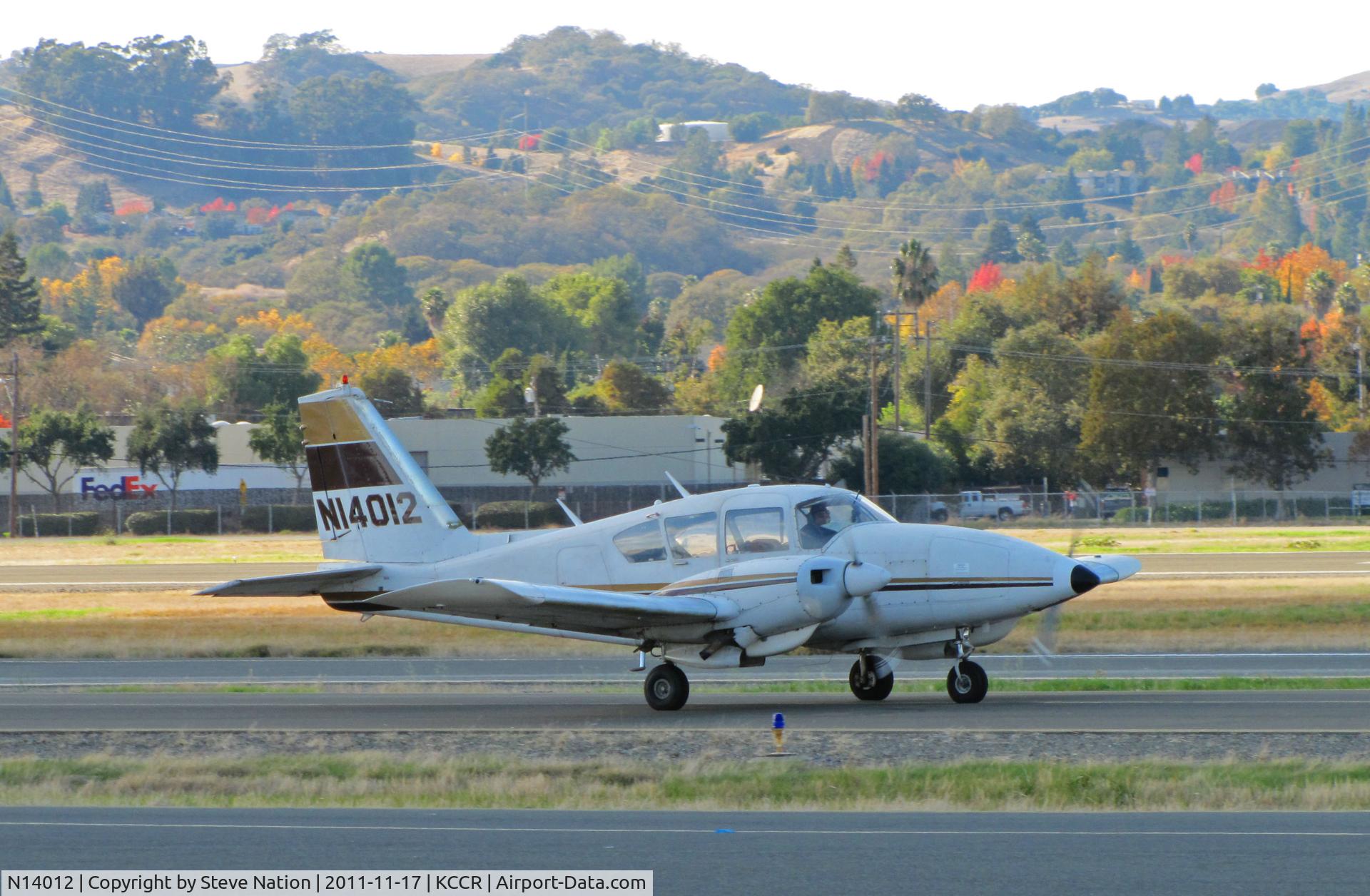 N14012, 1971 Piper PA-23-250 Aztec C/N 27-4629, Ja-Mar Industries (Santa Clara, CA) 1971 Piper PA-23-250 Aztec taxis for RWY 19R in late afternoon sun at Buchanan Field