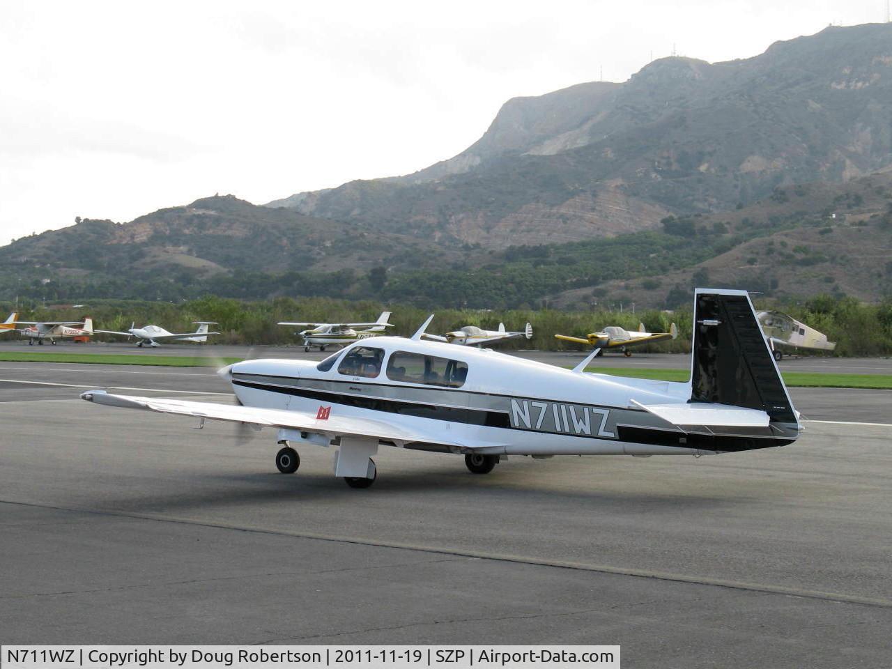 N711WZ, 1990 Mooney M20M Bravo C/N 27-0042, 1990 Mooney M20M TLS Turbo BRAVO, Lycoming TIO-540-AF1A 270 Hp, taxi to refueling dock