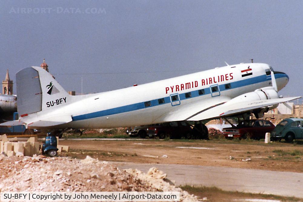 SU-BFY, 1943 Douglas DC-3C-S1C3G (C-47A) C/N 19754, This DC-3 later became PH-DDZ with the Dutch Dakota Association. Photo taken at Luqa, Malta, on Oct. 15, 1986.
