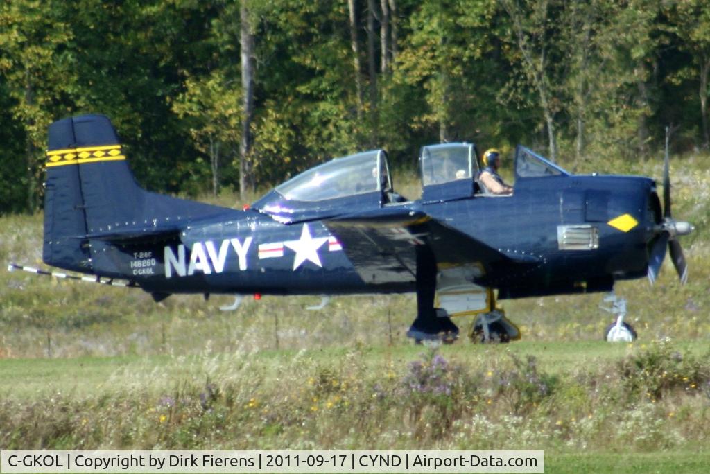 C-GKOL, 1957 North American T-28C Trojan C/N 252-23, Taxing down the rwy for takeoff.
