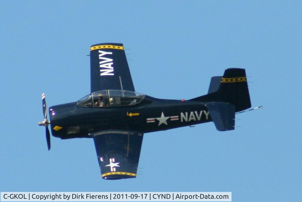 C-GKOL, 1957 North American T-28C Trojan C/N 252-23, Doing a flyover.