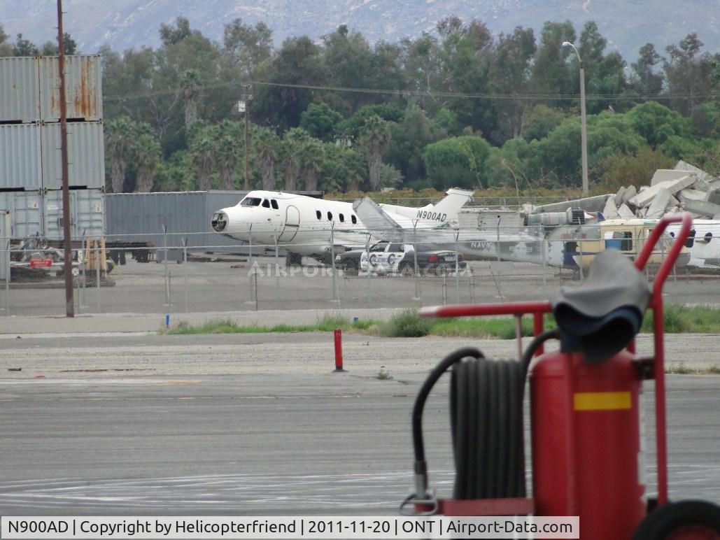 N900AD, 1971 Hawker Siddeley BH.125-400A C/N NA769, Parked in the Ontario Airport Fire Dept area, possibly for training