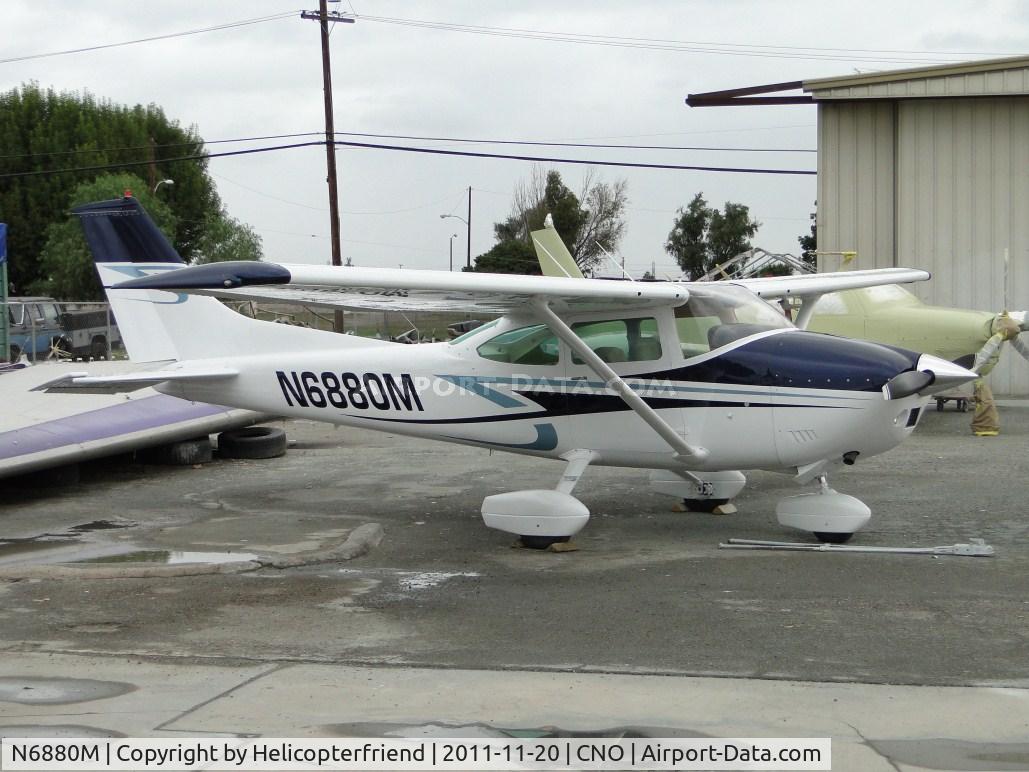 N6880M, 1975 Cessna 182P Skylane C/N 18263876, Parked in the paint shop parking area