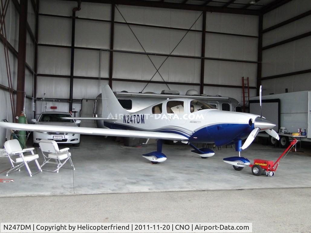 N247DM, 2005 Lancair LC41-550FG C/N 41506, Parked in the hanger out of the overcast weather