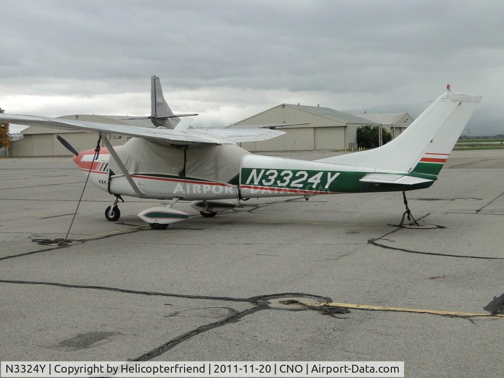 N3324Y, 1962 Cessna 182E Skylane C/N 18254324, Covered up, tied down and waiting for the rain