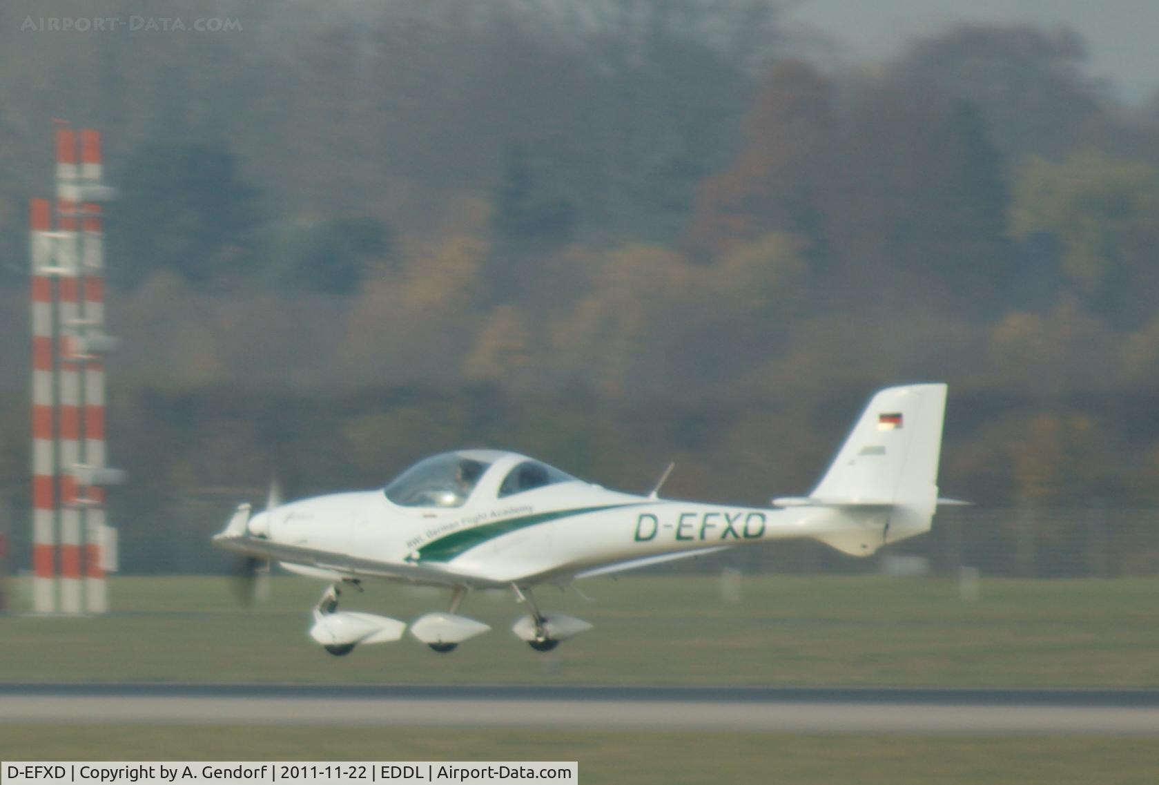 D-EFXD, Aquila A210 (AT01) C/N AT01-219, overflying Rwy 23L at Düsseldorf Int´l