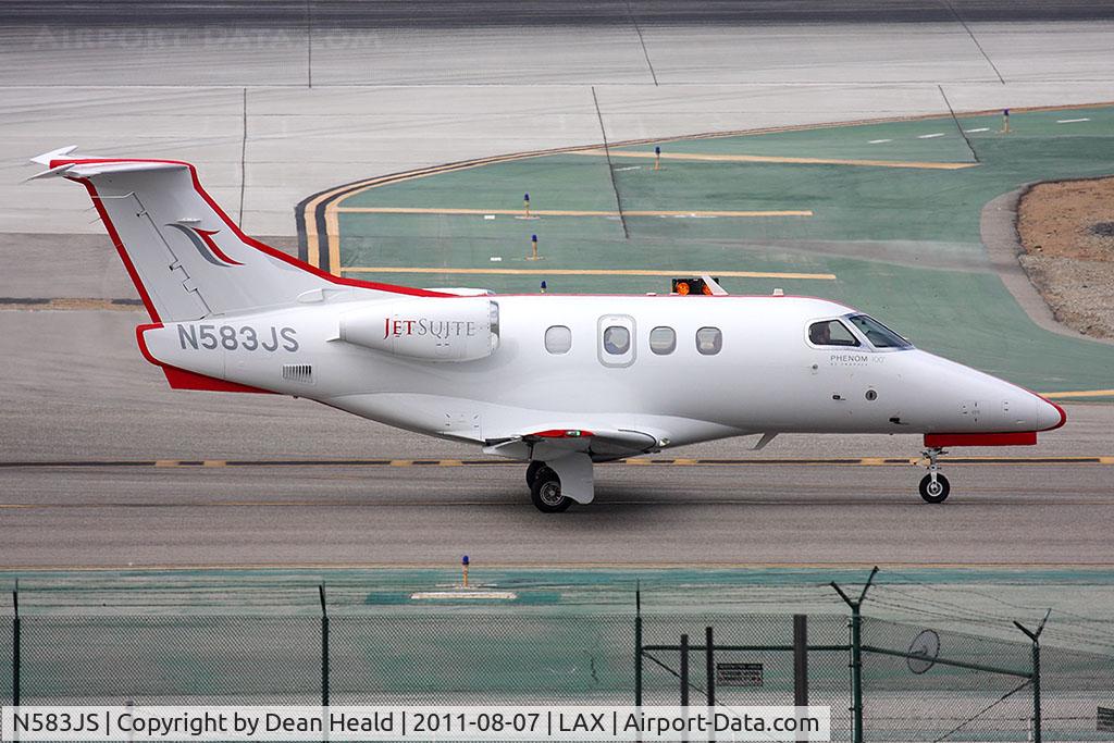 N583JS, 2010 Embraer EMB-500 Phenom 100 C/N 50000131, Jet Suite Air 2010 Embraer 500 Phenom 100 N583JS taxiing to parking after arrival.
