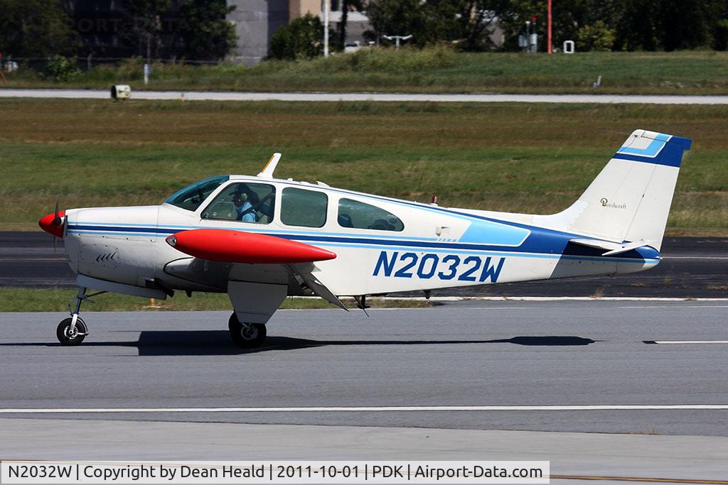 N2032W, 1965 Beech 35-C33 Debonair C/N CD-977, Taxiing to parking after arrival from Falcon Field Airport (KFFC).