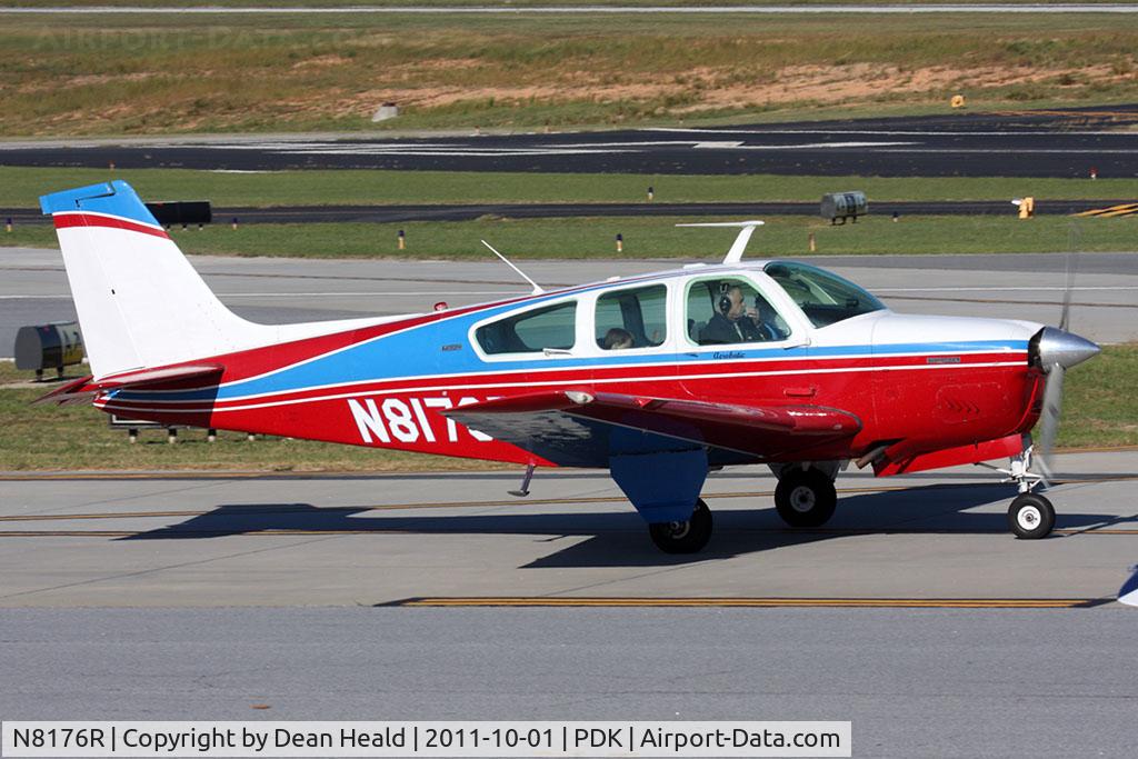 N8176R, 1974 Beech F33C Bonanza C/N CJ-53, Pat Epps Aerobatics 1974 Beechcraft F33C Bonanza N8176R taxiing to RWY 2L for takeoff.