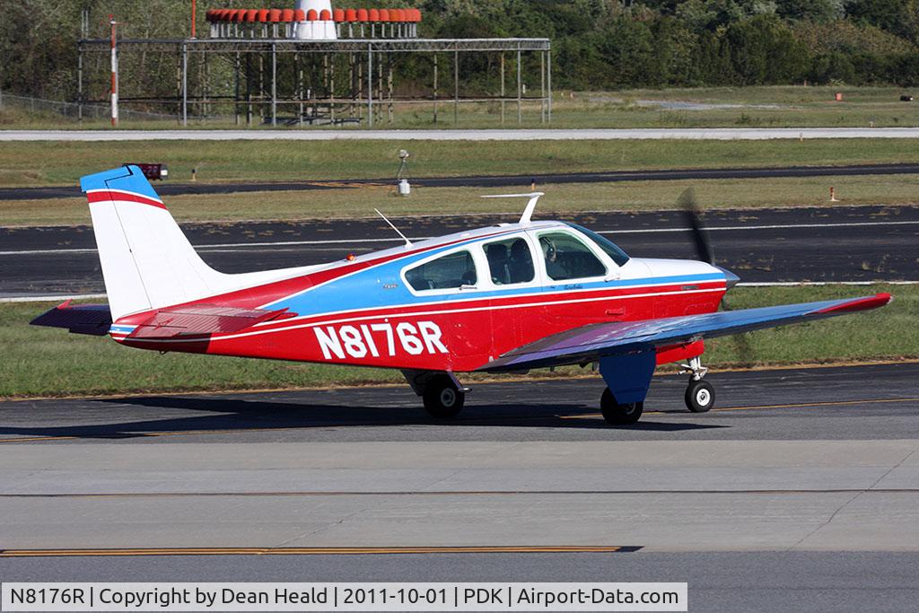 N8176R, 1974 Beech F33C Bonanza C/N CJ-53, Pat Epps Aerobatics 1974 Beechcraft F33C Bonanza N8176R taxiing to RWY 2L for takeoff.