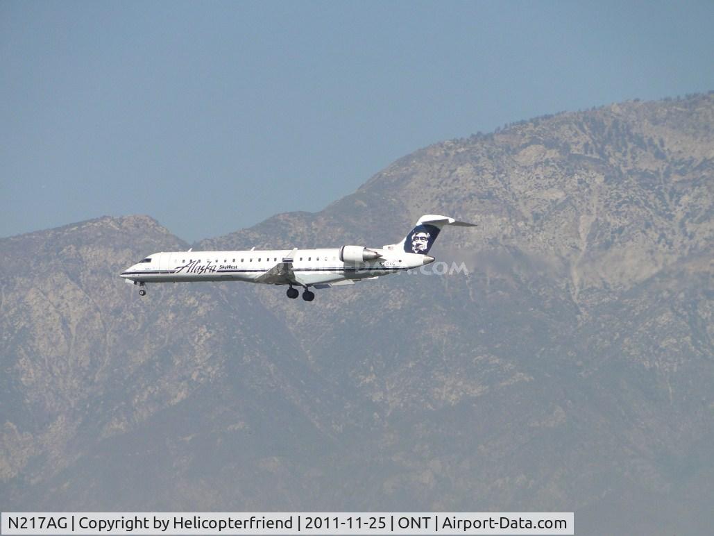 N217AG, 2001 Bombardier CRJ-701 (CL-600-2C10) Regional Jet C/N 10031, On final to runway 26R
