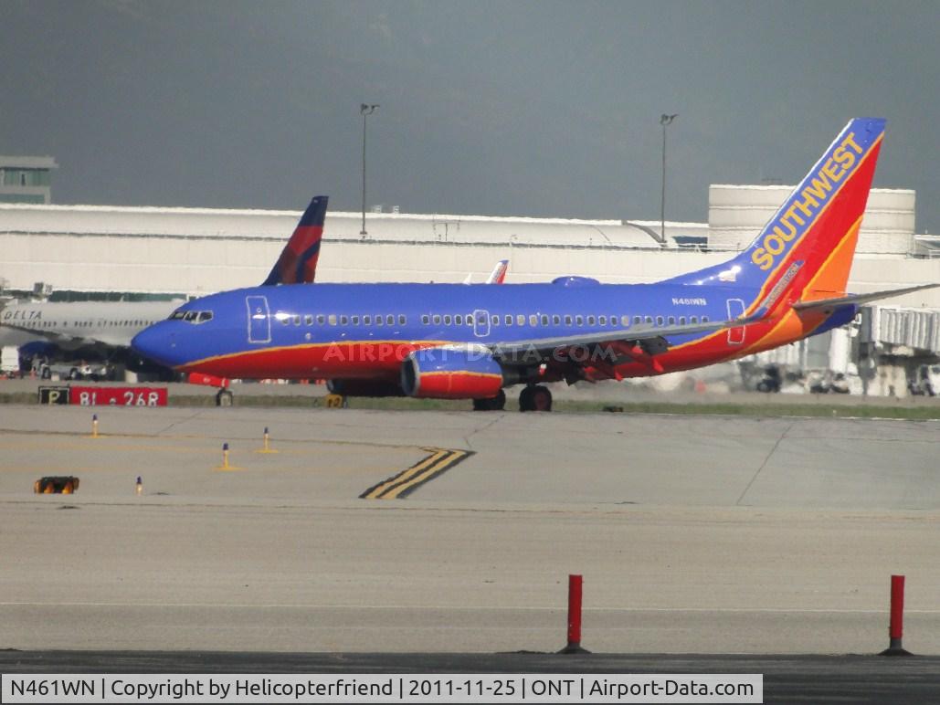 N461WN, 2004 Boeing 737-7H4 C/N 32465, Slowing down after landing on runway 26R too head back eastbound to the terminal