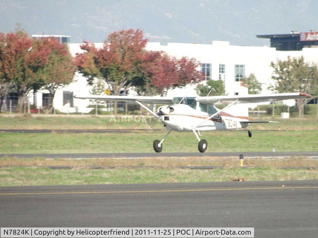 N7824K, 1976 Cessna 180J C/N 18052758, Tail wheel up and gaining speed for take off on runway 26L