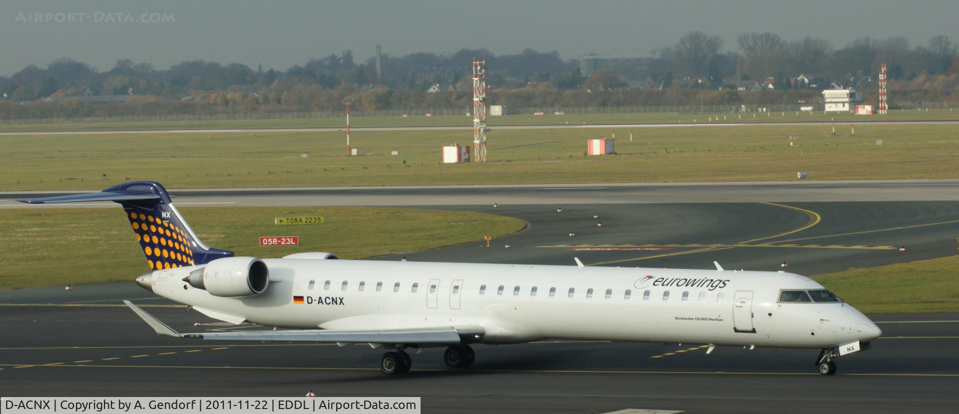 D-ACNX, 2011 Bombardier CRJ-900 NG (CL-600-2D24) C/N 15270, Eurowings (Lufthansa Regional cs.) is taxiing for departure at Düsseldorf Int´l (EDDL)