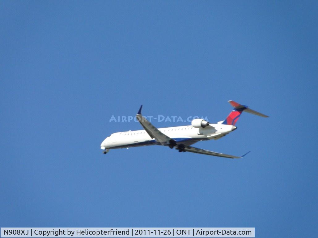 N908XJ, 2007 Bombardier CRJ-900ER (CL-600-2D24) C/N 15140, Putting on the power, retracting the landing gear and going around for another approach