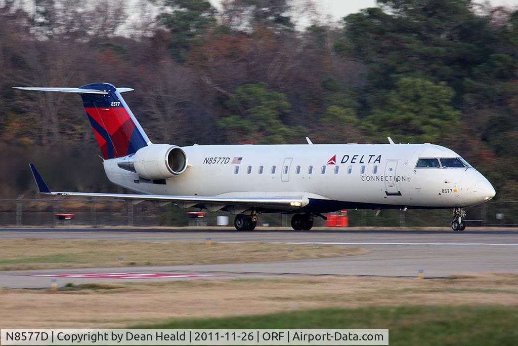N8577D, 2001 Bombardier CRJ-200LR (CL-600-2B19) C/N 7577, Delta Connection (Pinnacle Airlines) N8577D (FLT FLG4143) starting takeoff roll on RWY 23 en route to Boston Logan Int'l (KBOS).