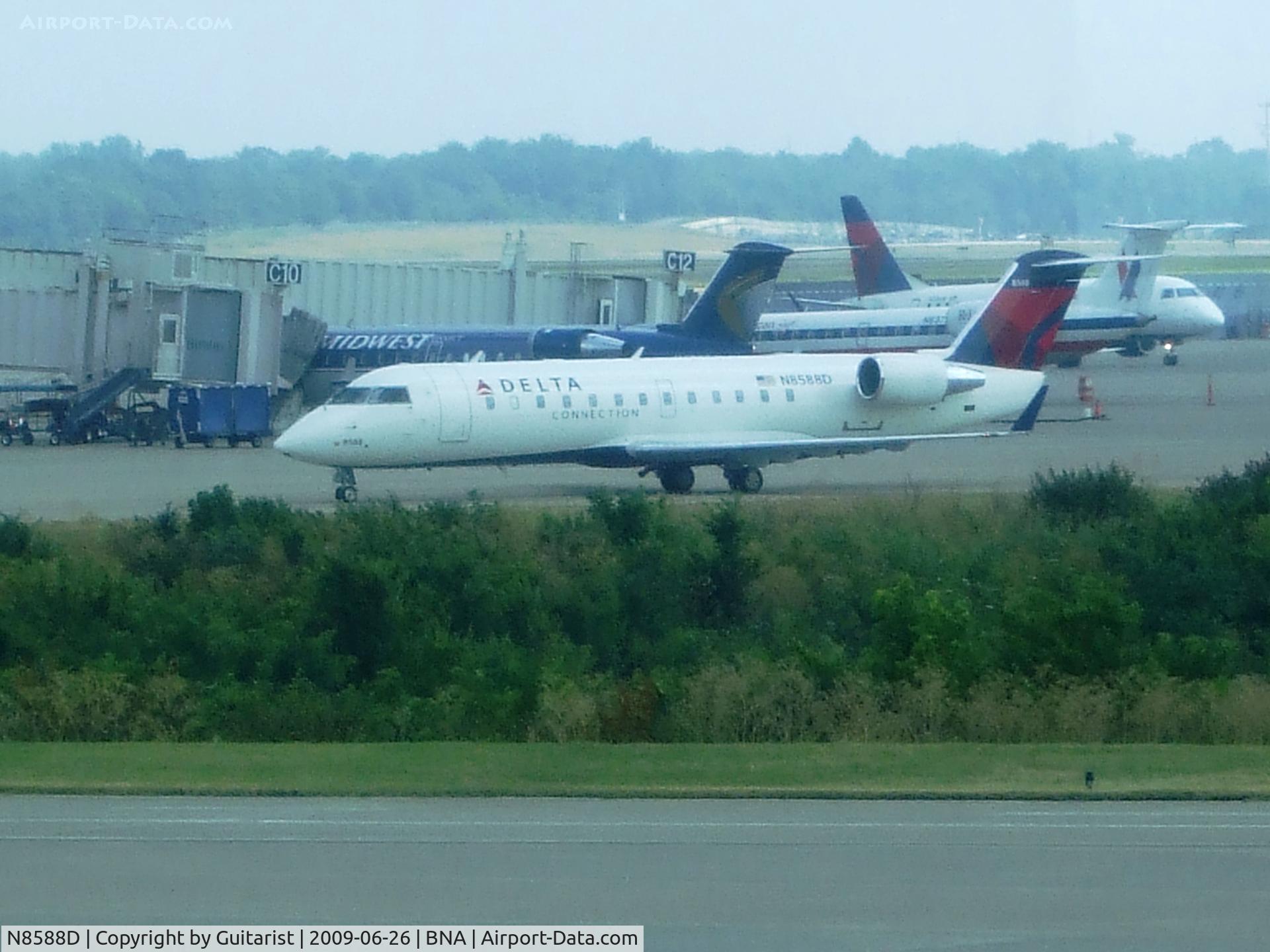 N8588D, 2001 Bombardier CRJ-200LR (CL-600-2B19) C/N 7588, Sat watching the world go by