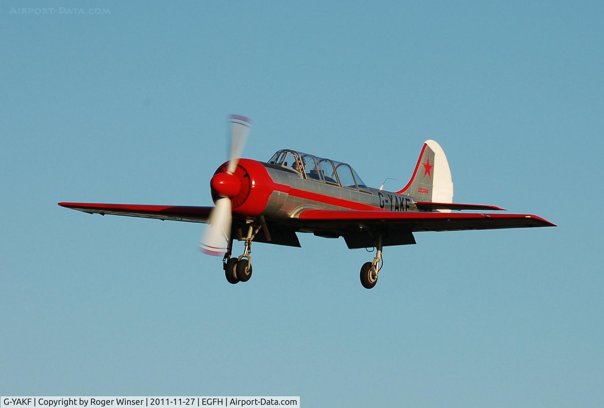 G-YAKF, 1991 Yakovlev (Aerostar) Yak-52 C/N 9111205, Resident Yak-52 on finals Runway 28. Previouis registration ZU-IAK.