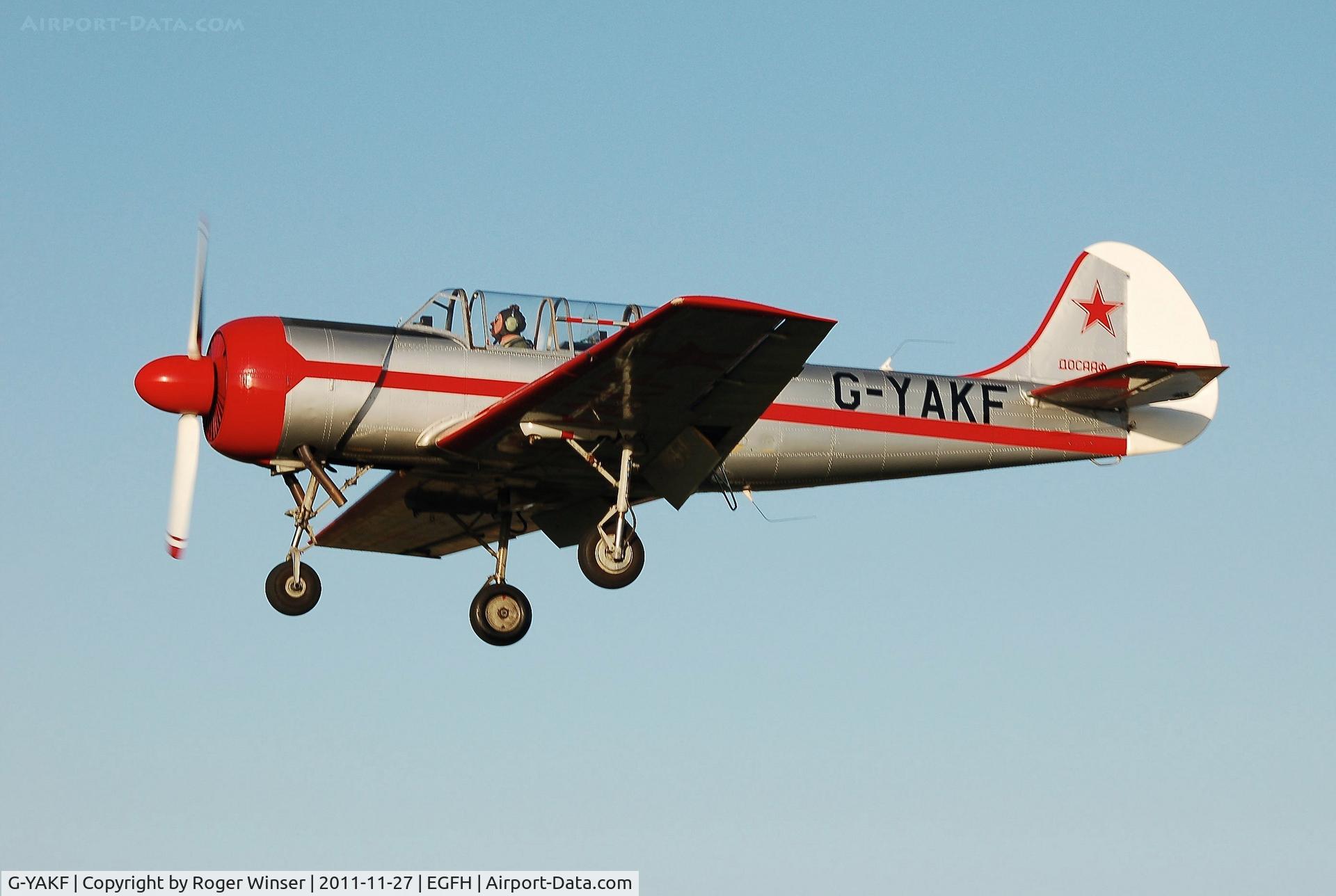 G-YAKF, 1991 Yakovlev (Aerostar) Yak-52 C/N 9111205, Resident Yak-52 on finals Runway 28. Previous registration ZU-IAK.
