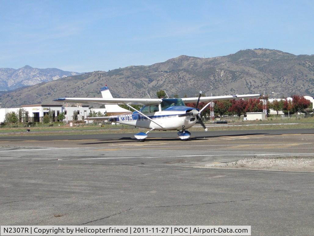 N2307R, 1964 Cessna 182G Skylane C/N 18255407, Taxiing towards Howard Aviation area