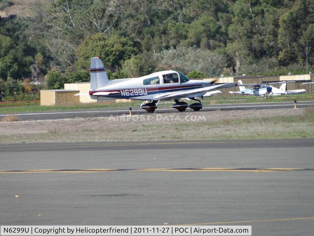 N6299U, 1975 Grumman American AA-5 Traveler C/N AA5-0782, Waiting for permission to cross runways enroute back to hanger