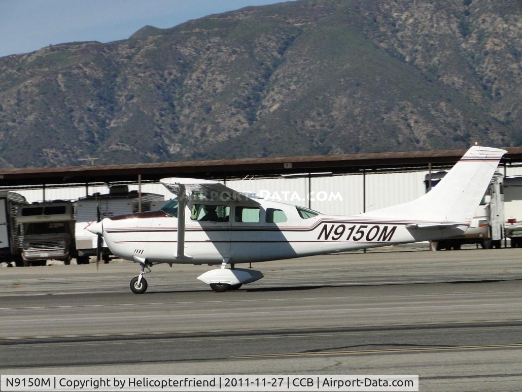 N9150M, 1970 Cessna U206E Stationair C/N U20601550, Touching down on runway 24 on a very windy day