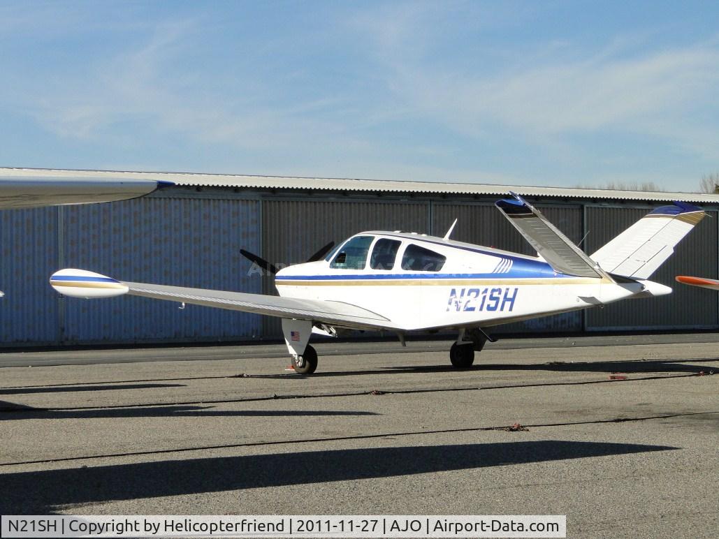 N21SH, 1986 Beech V35 Bonanza C/N D-8423, Parked in the east parking area near the hangers