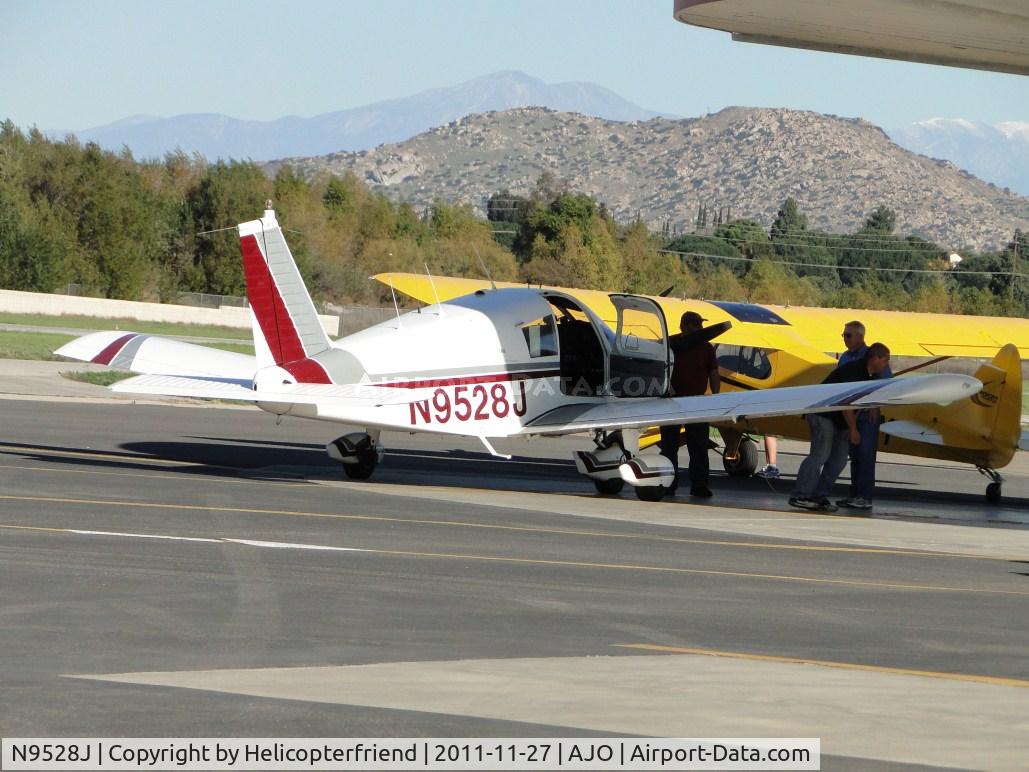 N9528J, 1966 Piper PA-28-180 Cherokee C/N 28-3654, Parked at fueling station west of Cubcrafters N188CM