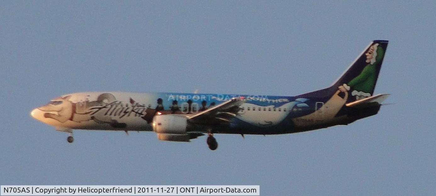 N705AS, 1998 Boeing 737-490 C/N 29318, Flt 538, coming from Seattle, Wa, with strong winds at ONT caused this ship to make her downwind leg north of my house for runway 8