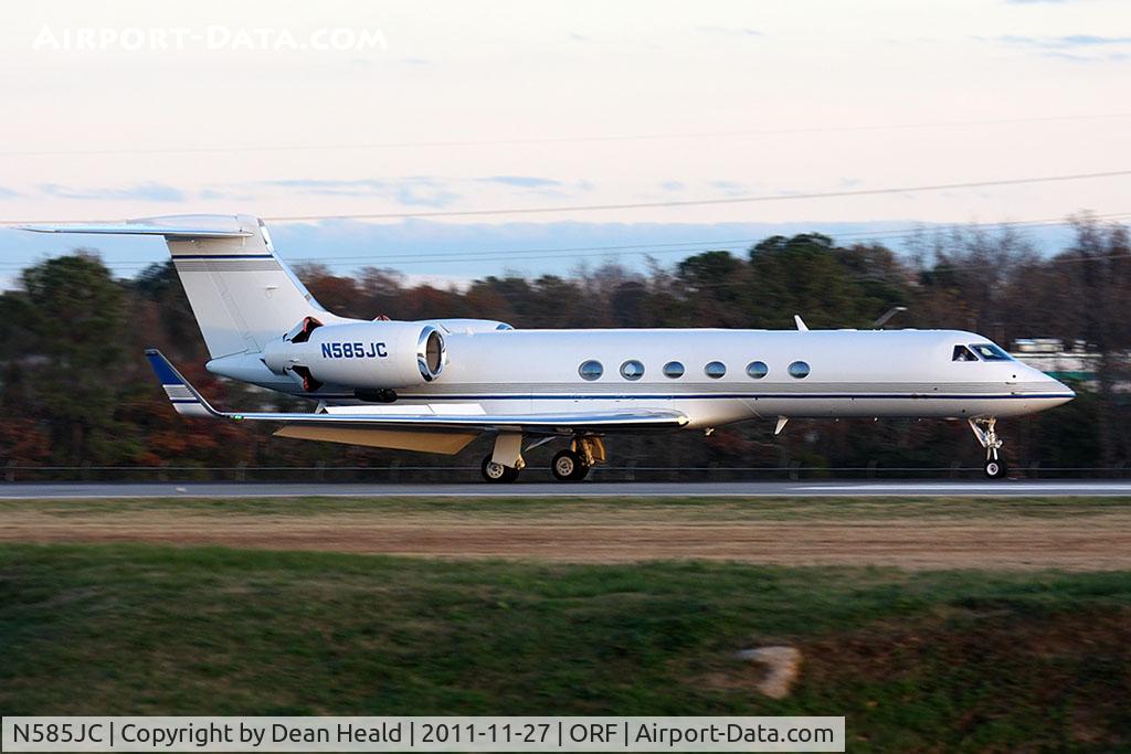 N585JC, 2000 Gulfstream Aerospace G-V C/N 618, Hilton Hotels Corporation's 2000 Gulfstream G-V N585JC from The Florida Keys Marathon Airport (KMTH) rolling out after landing on RWY 23 just before sunset. Used the call-sign 