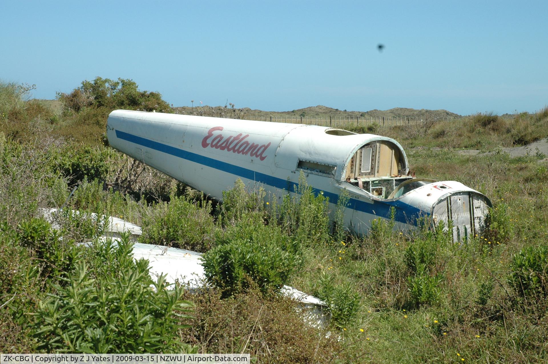 ZK-CBG, 1961 Fletcher FU24 C/N 87, The fuselage of ZK-CBG resting outside the boundary fence at Wanganui, centre-wing to the left.