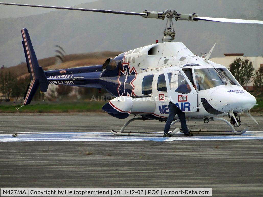 N427MA, 1987 Bell 222UT C/N 47558, Appears mechanic exited and responded to pilot's side to check something