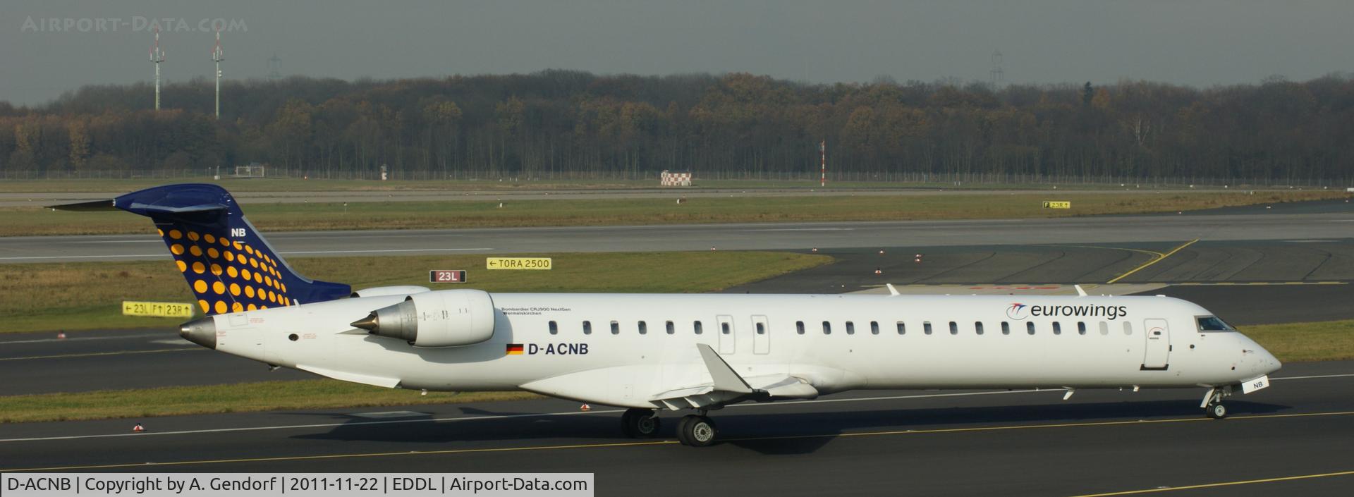 D-ACNB, 2009 Bombardier CRJ-900ER (CL-600-2D24) C/N 15230, Eurowings (Lufthansa Regional cs.) is taxiing for departure at Düsseldorf Int´l (EDDL)