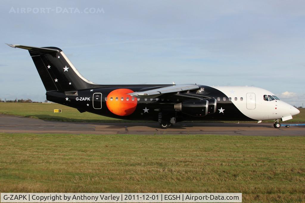 G-ZAPK, 1989 British Aerospace BAe.146-200QC Quick Change C/N E2148, Being towed from the north side back to the eastern after a compass check.