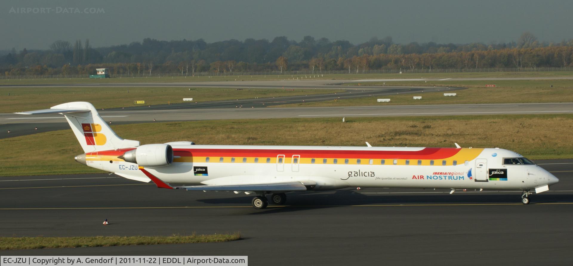 EC-JZU, 2007 Bombardier CRJ-900 (CL-600-2D24) C/N 15115, Air Nostrum (Iberia Regional cs. and Galicia sticker), on the Taxiway at Düsseldorf Int´l (EDDL)