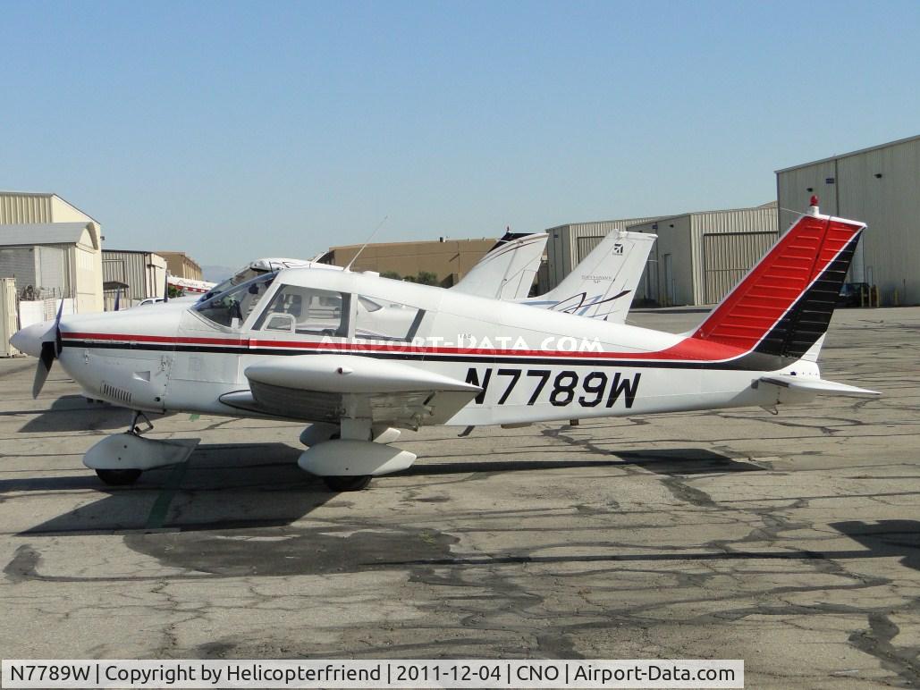 N7789W, 1964 Piper PA-28-180 C/N 28-1798, Parked south of the paint shop area