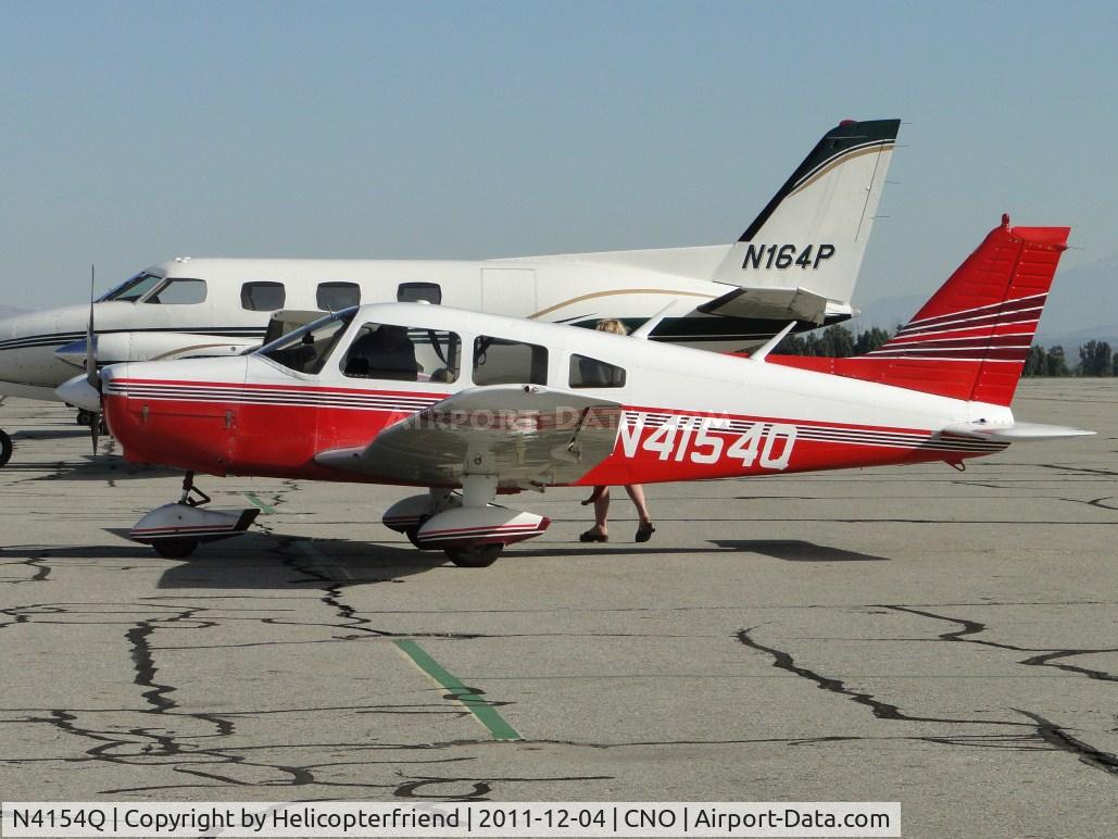 N4154Q, Piper PA-28-151 C/N 28-7715285, Parked south of the tower and being loaded up for flight