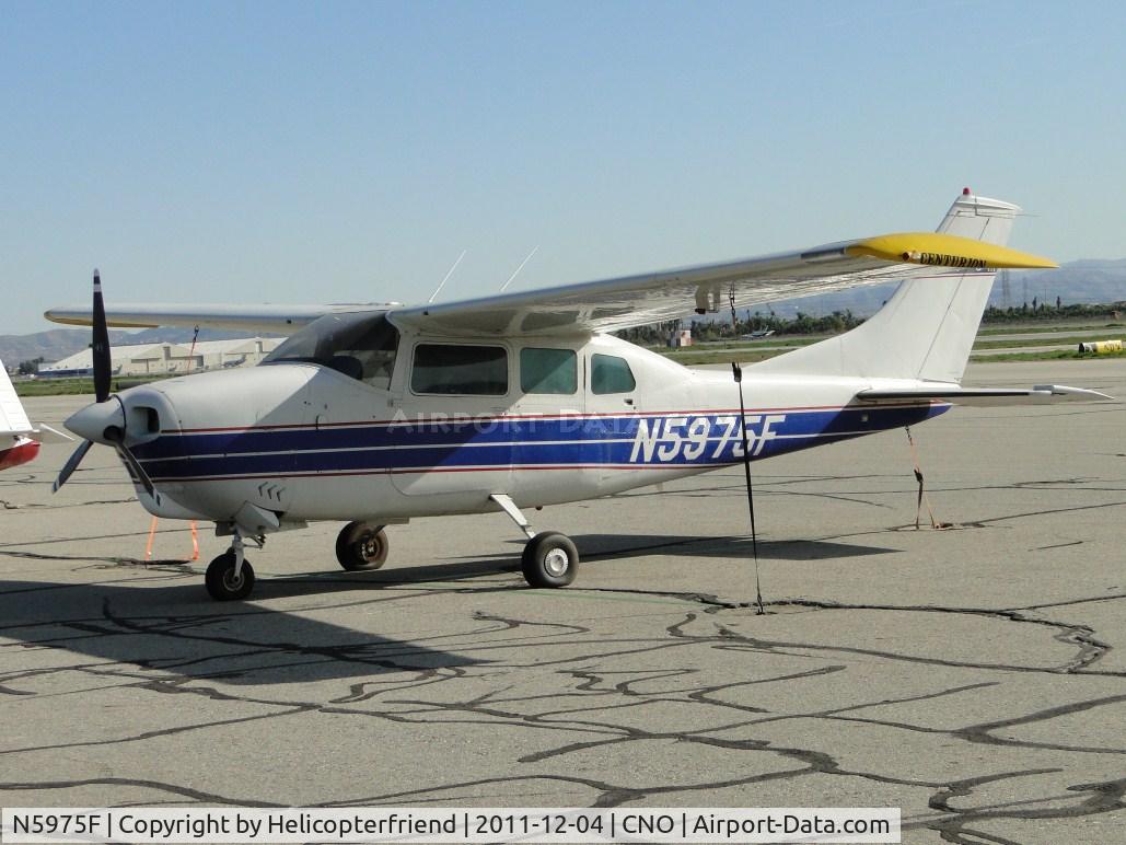 N5975F, 1968 Cessna 210H Centurion C/N 21058975, Tied down and parked south of the tower