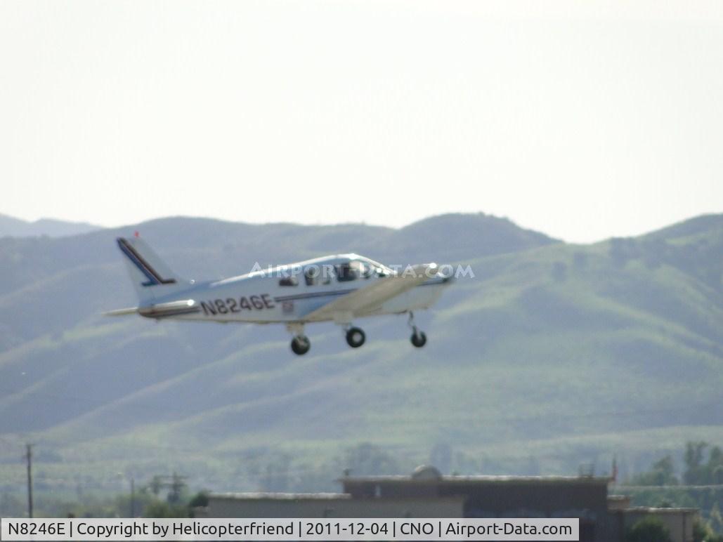 N8246E, 1982 Piper PA-28-161 C/N 28-8216189, Climbing out from runway 26L
