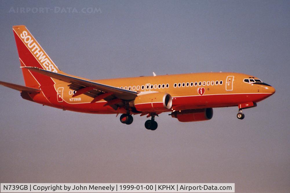 N739GB, 1998 Boeing 737-7H4 C/N 29275, Sunrise shot - scanned from a print