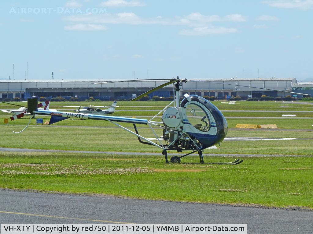 VH-XTY, 1999 Schweizer 269C-1 C/N 0102, Schweizer VH-XTY at Moorabbin. This aircraft was severely damaged in an accident less than 3 hours after this photo was taken, when it struck the ground while on a training flight. The occupants were uninjured.