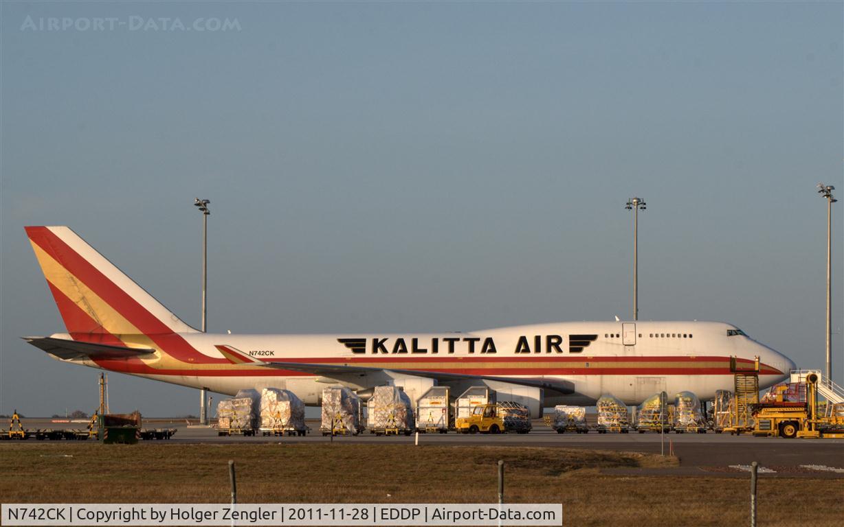 N742CK, 1990 Boeing 747-446 C/N 24424, View over the fence at DHL railway station to one of two Connys being loaded this afternoon.