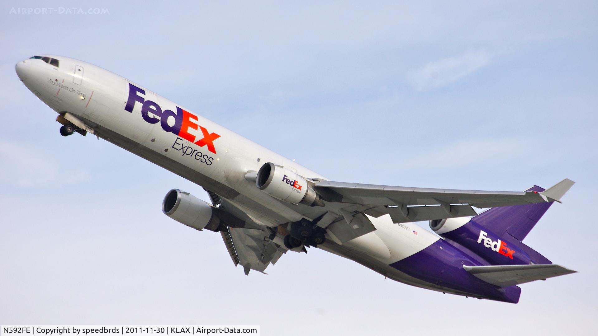 N592FE, 1992 McDonnell Douglas MD-11F C/N 48550, FedEx MD-11F departing 25L