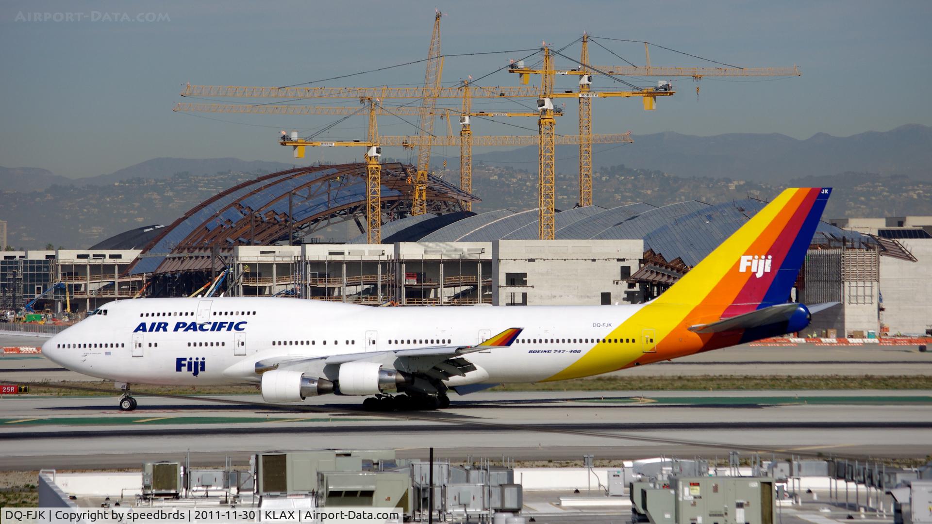 DQ-FJK, 1989 Boeing 747-412 C/N 24064, Air Pacific exiting 25L via hish speed taxiway 