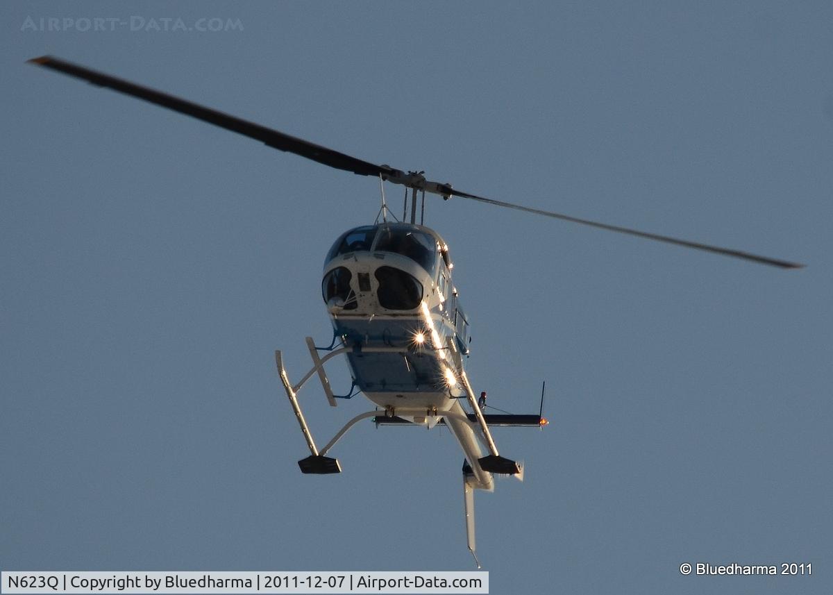 N623Q, 1988 Bell 206L-3 LongRanger III C/N 51258, Flying over West Littleton, Colorado.