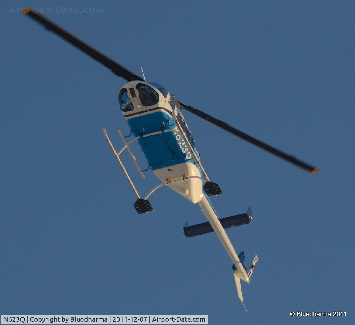 N623Q, 1988 Bell 206L-3 LongRanger III C/N 51258, Flying over West Littleton, Colorado.