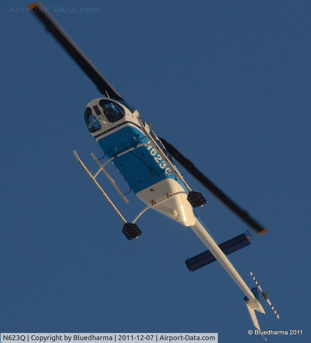 N623Q, 1988 Bell 206L-3 LongRanger III C/N 51258, Flying over West Littleton, Colorado.