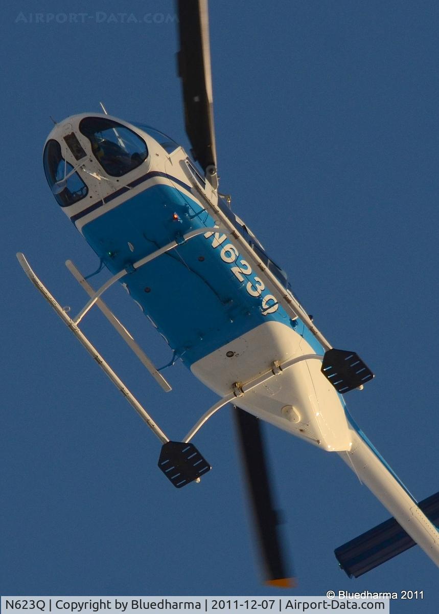 N623Q, 1988 Bell 206L-3 LongRanger III C/N 51258, Flying over West Littleton, Colorado.