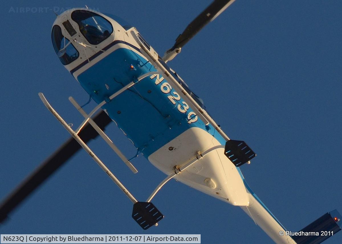 N623Q, 1988 Bell 206L-3 LongRanger III C/N 51258, Flying over West Littleton, Colorado.