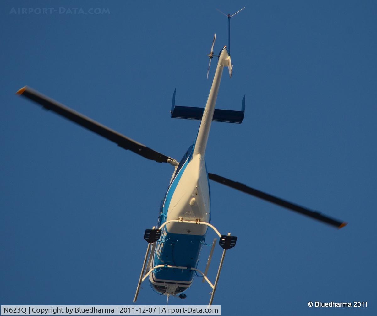 N623Q, 1988 Bell 206L-3 LongRanger III C/N 51258, Flying over West Littleton, Colorado.